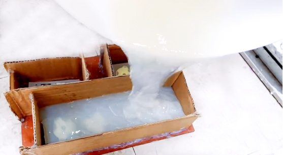 Resin poured into a mould box before cure